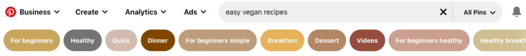 Pinterest search bar showing recommended long-tail keywords for easy vegan recipes