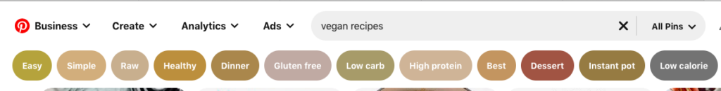 Pinterest search bar showing recommended long-tail keywords for vegan recipes